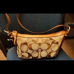 Women Vintage Coach tan cloth with leather strap